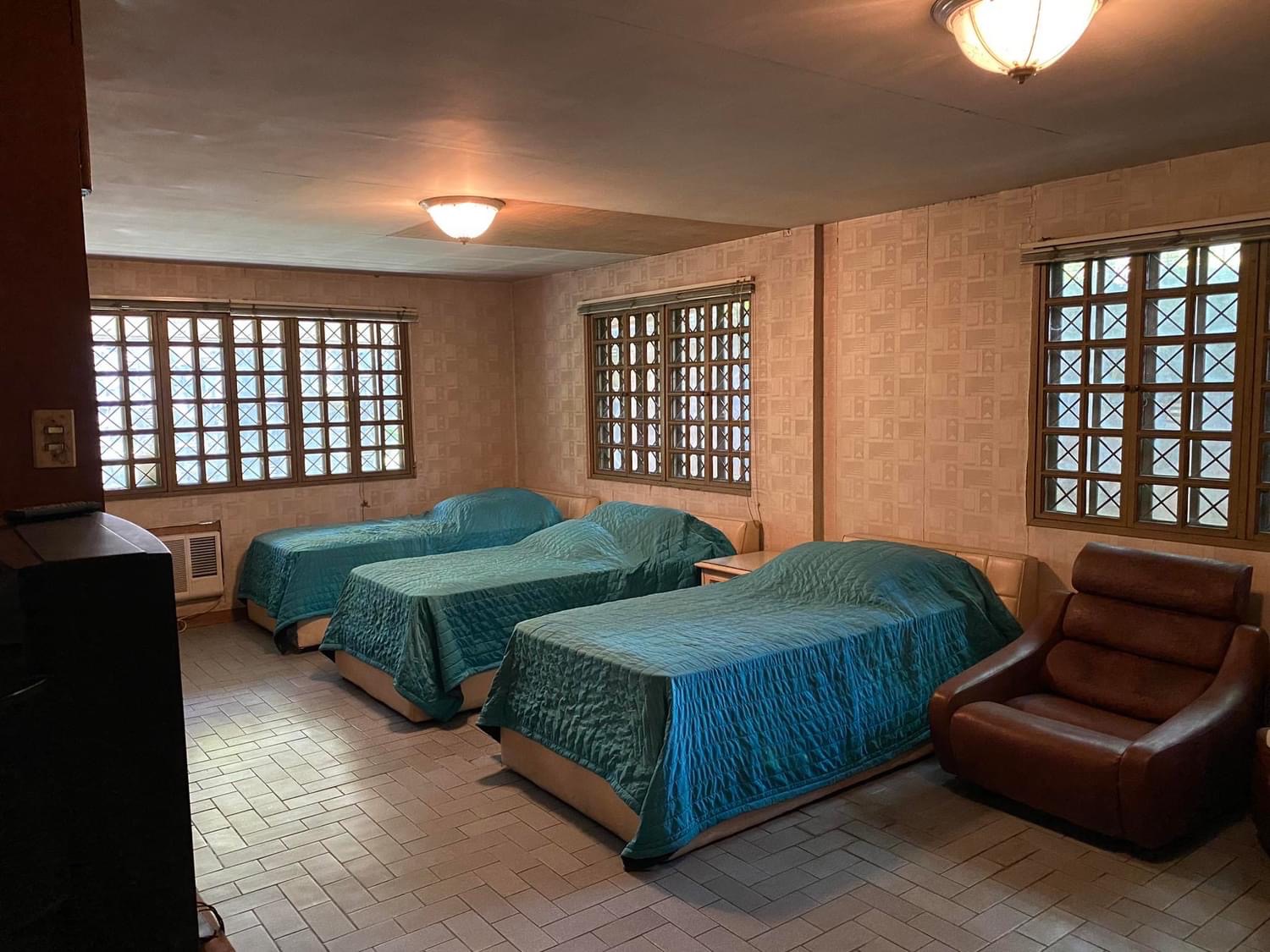 Bedroom with multiple beds